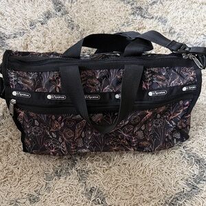 Lesportsac Black sports Bag with Pink Floral Outline